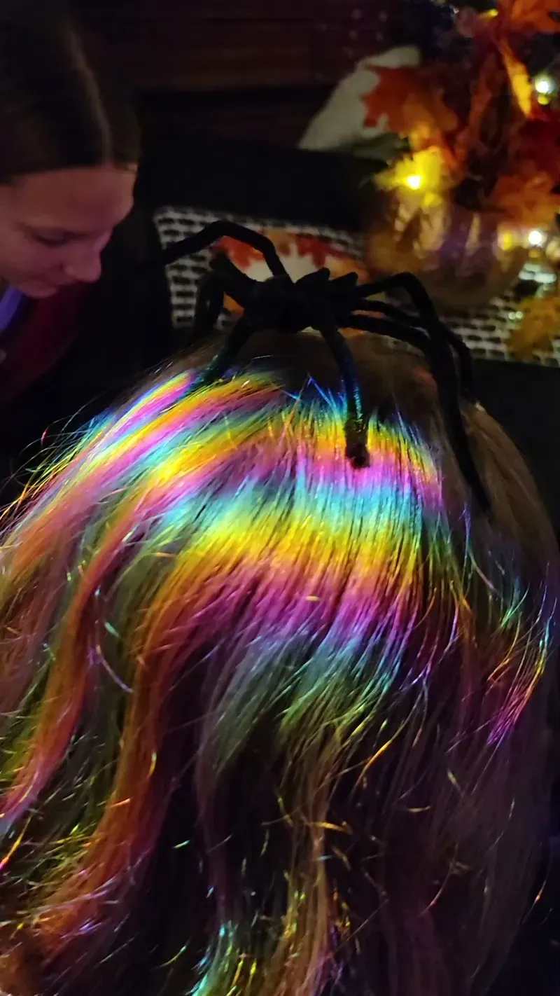 A rainbow-coloured spider in the Halloween decor